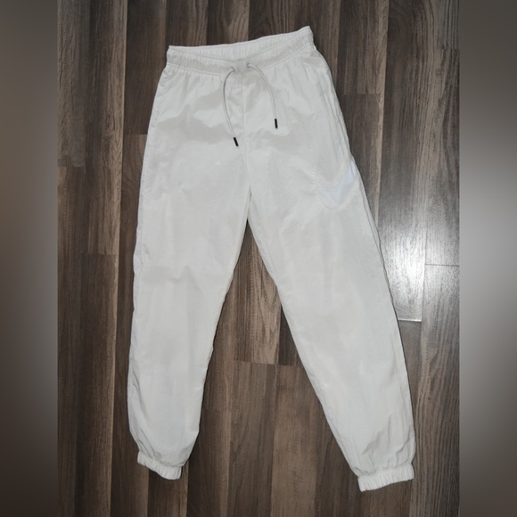 Nike nylon pull on joggers track pants cream elastic waist women’s size XS - Picture 1 of 9